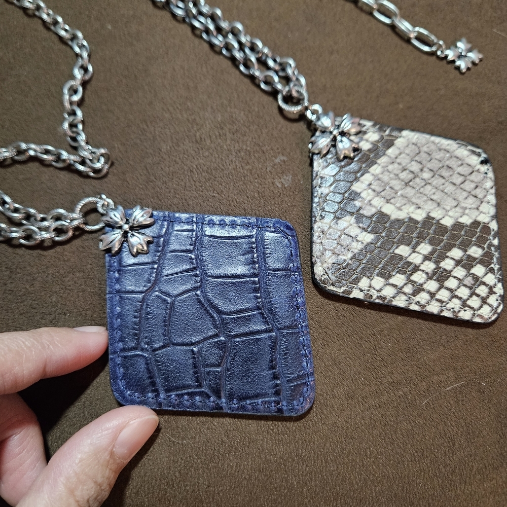2 reversible Necklace with leather pendant.